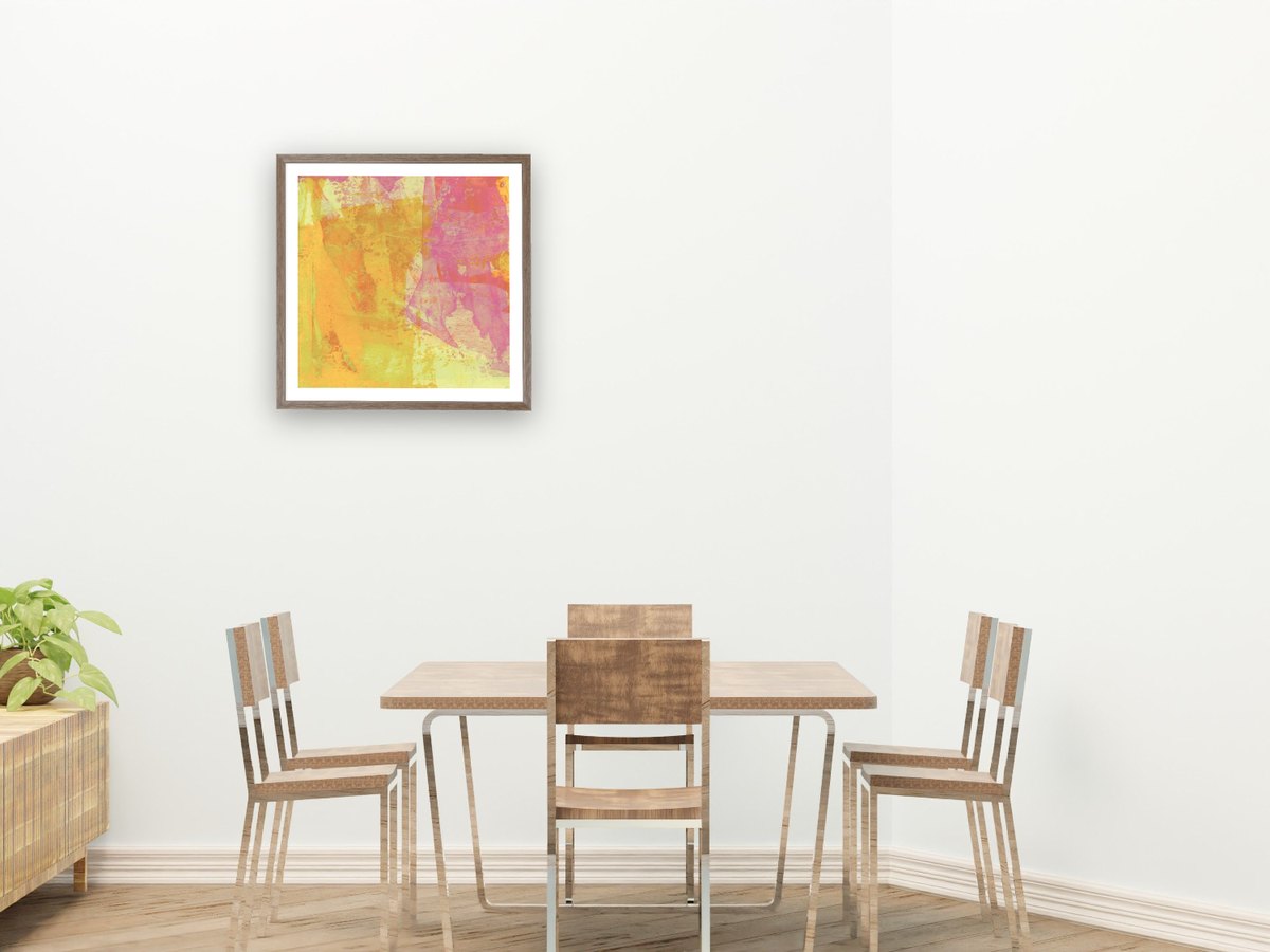 A framed print on the wall of a restaurant dining room