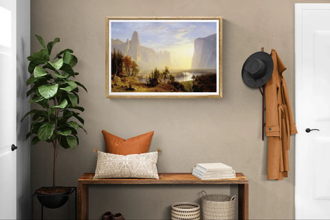 Albert Bierstadt's Yosemite Valley in a gold frame above an entryway bench