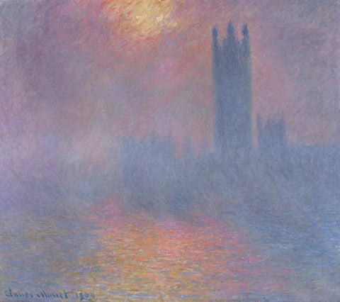 The Houses of Parliament, London, with the sun breaking through the fog