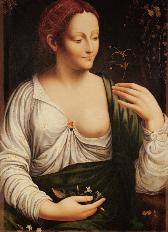 A woman with reddish hair holds a plant stem, wearing white and green draped garments against a dark background.