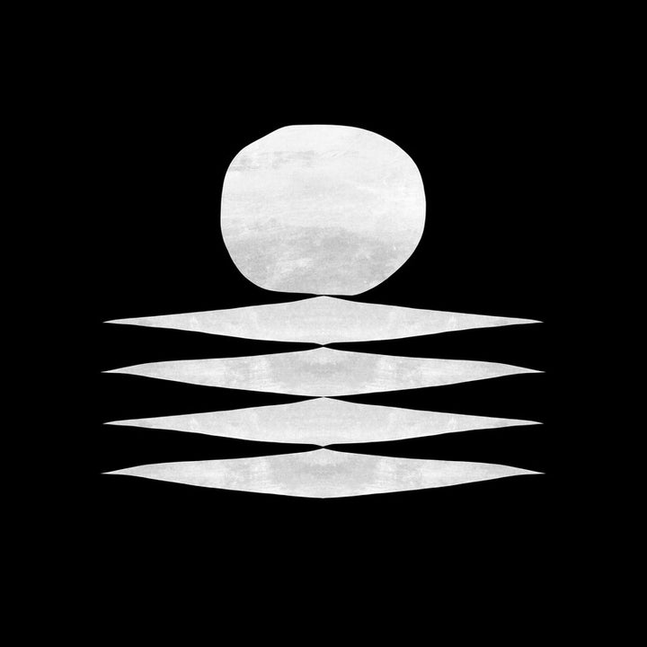 A white oval shape sits above four horizontal diamond forms against a black background.