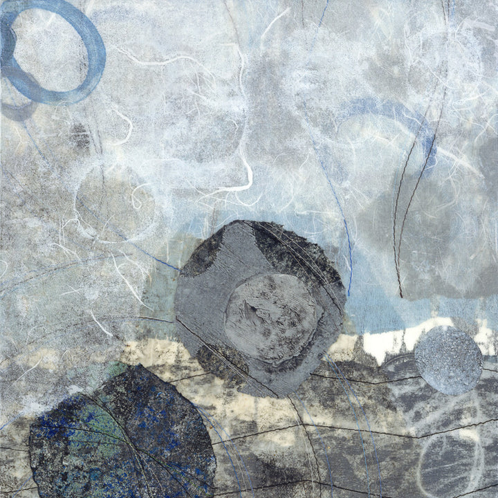 Abstract mixed-media artwork with layered circular and organic forms in blue, gray, black, and cream tones on textured background.