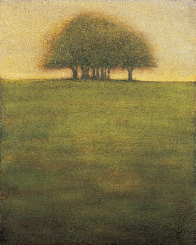 A solitary cluster of trees stands on the horizon of a vast green field beneath a pale yellow sky.