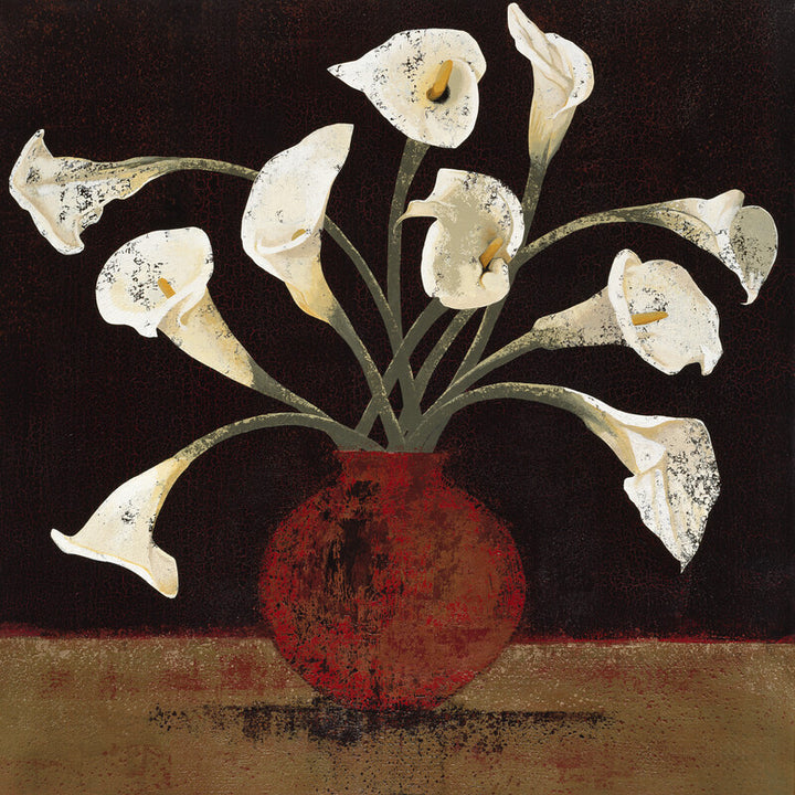 White calla lilies with spotted petals arranged in a deep red vase against a dark background with a tan base.