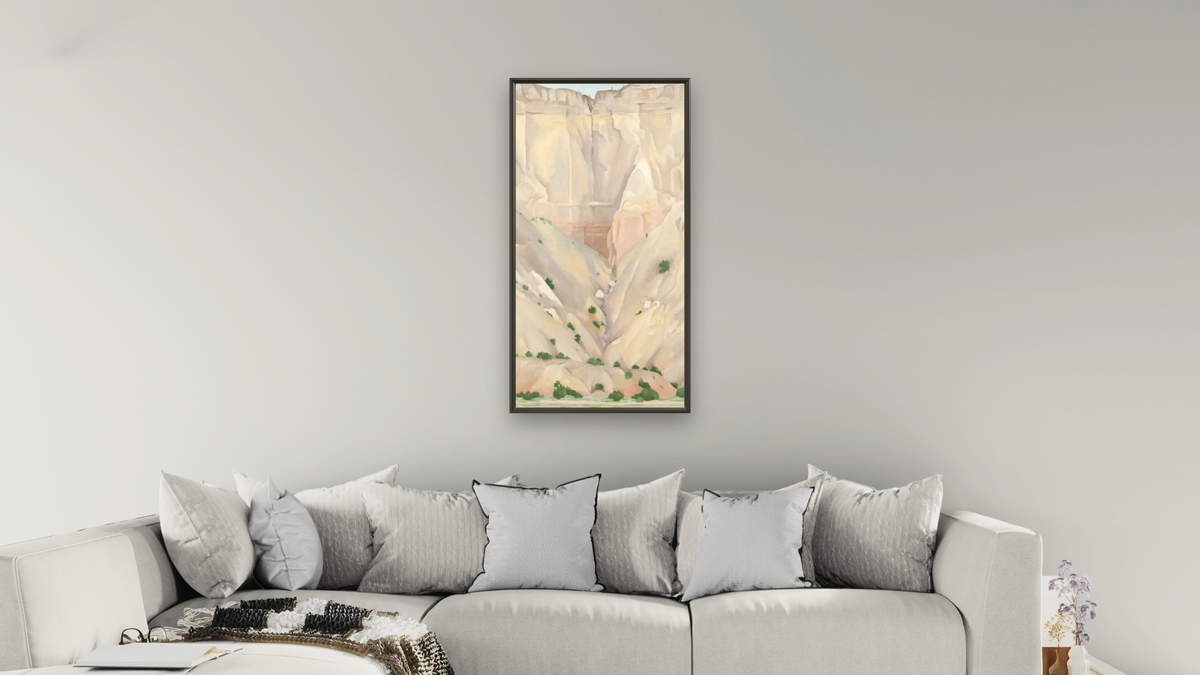Cliffs Beyond Abiquiu, Dry Waterfall by Georgia O'Keeffe, shown at 20 × 40 in (50.8 × 101.6 cm) on canvas in Ramino Satin Black, living