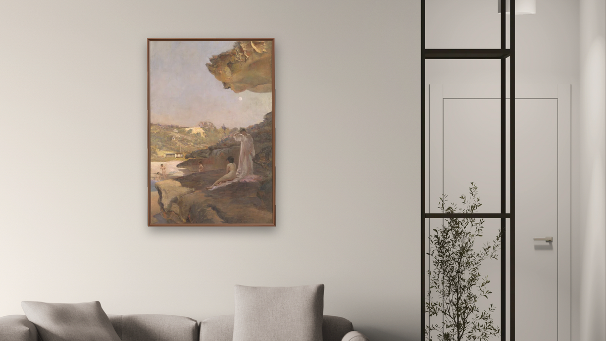 Tamarama Beach, forty years ago, a summer morning by Julian Ashton, shown at 28 × 42 in (71.1 × 106.7 cm) on canvas in Arber Warm Walnut, living