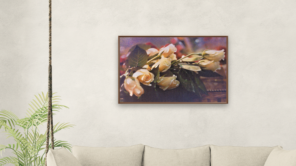 Basket Roses by Kirsten Söderlind, shown at 28 × 42 in (71.1 × 106.7 cm) on canvas in Arber Warm Walnut, living