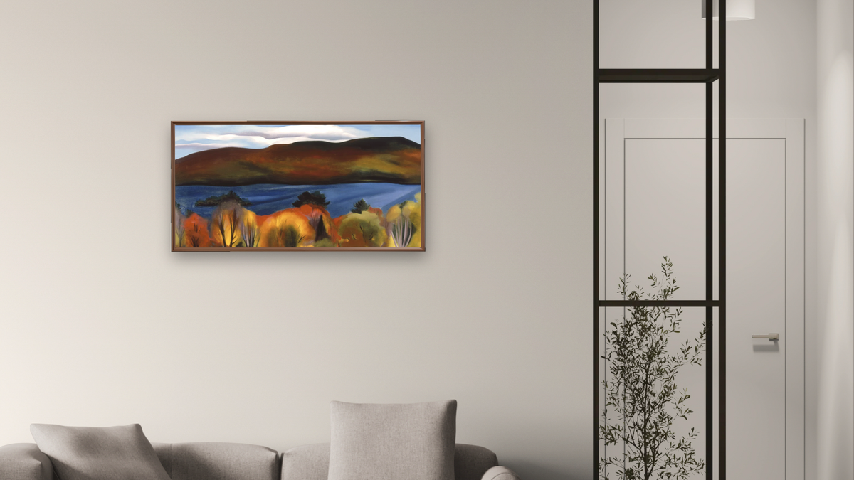 Lake George Autumn by Georgia O'Keeffe, shown at 20 × 40 in (50.8 × 101.6 cm) on canvas in Arber Warm Walnut, living