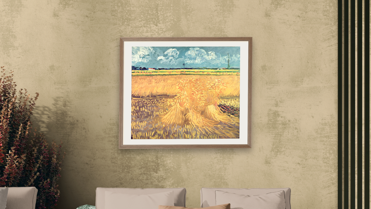 Wheat Field (Le Champ de Blé) by Vincent van Gogh, shown at 32 × 40 in (81.3 × 101.6 cm) in Arber Light Walnut, living