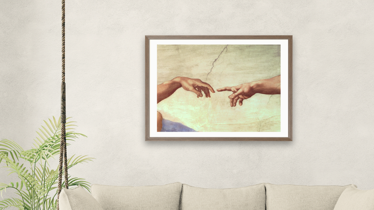 Hands of God and Adam, detail from The Creation of Adam, from the Sistine Ceiling (pre restoration) by Michelangelo Buonarroti, shown at 30 × 40 in (76.2 × 101.6 cm) in Arber Light Walnut, living