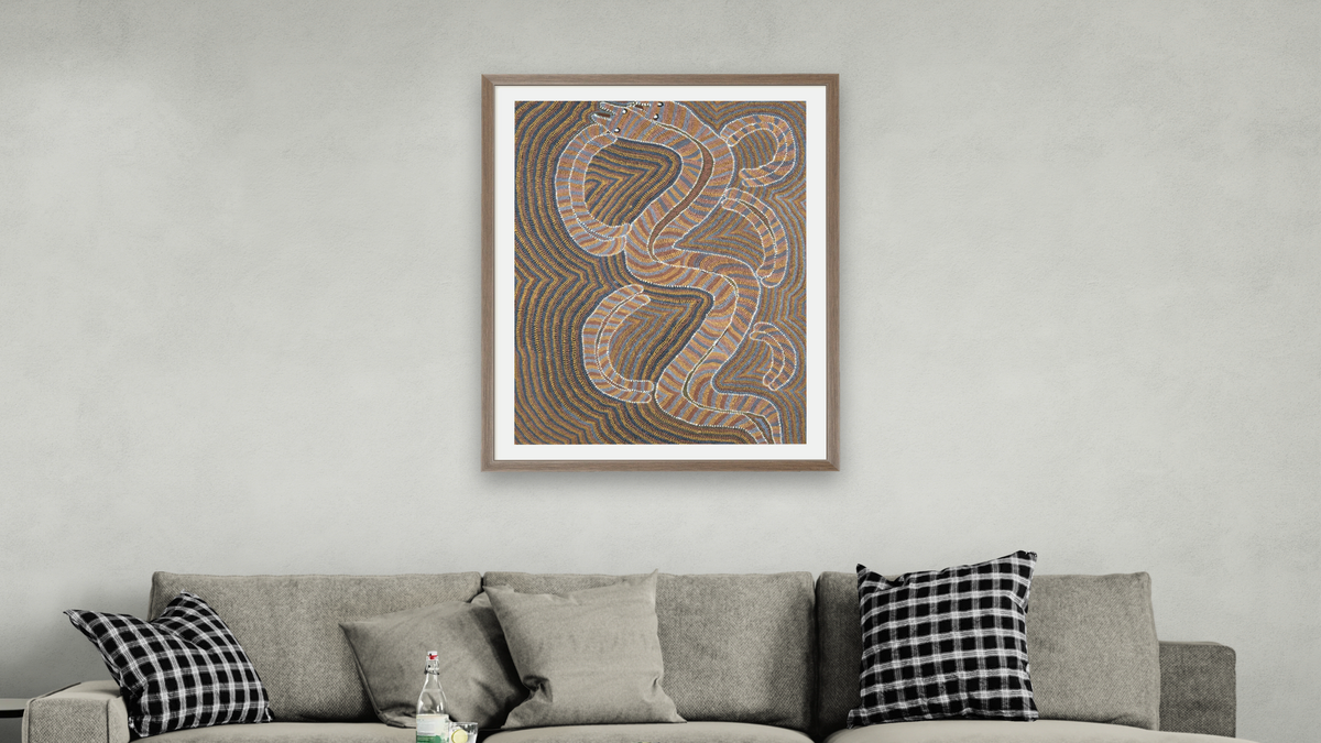 Snake Dreaming by George Tjangala, shown at 30 × 40 in (76.2 × 101.6 cm) in Arber Light Walnut, living