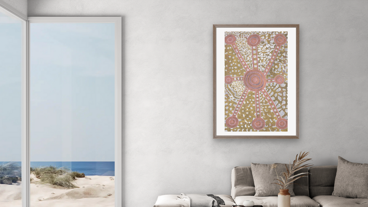 Water Dreaming by Long Jack Phillipus Tjakamarra, shown at 28 × 42 in (71.1 × 106.7 cm) in Arber Light Walnut, living