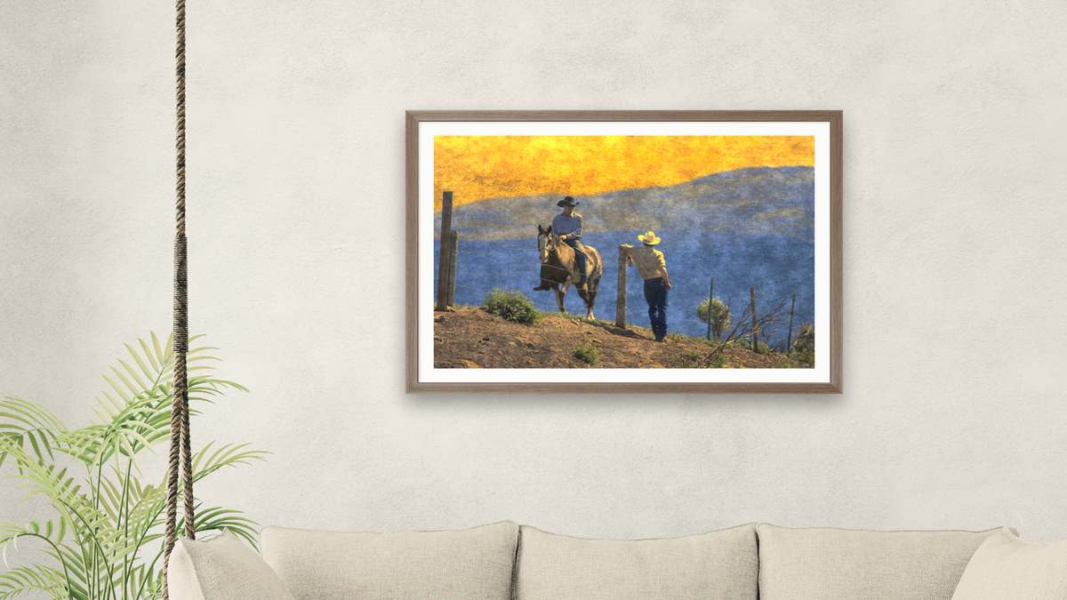 Cowboys by Doug Landreth, shown at 28 × 42 in (71.1 × 106.7 cm) in Arber Light Walnut, living