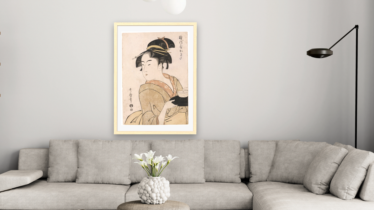 A bust portrait of the waitress Okita of the Naniwaya Teahouse by Kitagawa Utamaro, shown at 28 × 42 in (71.1 × 106.7 cm) in Arber Natural, living
