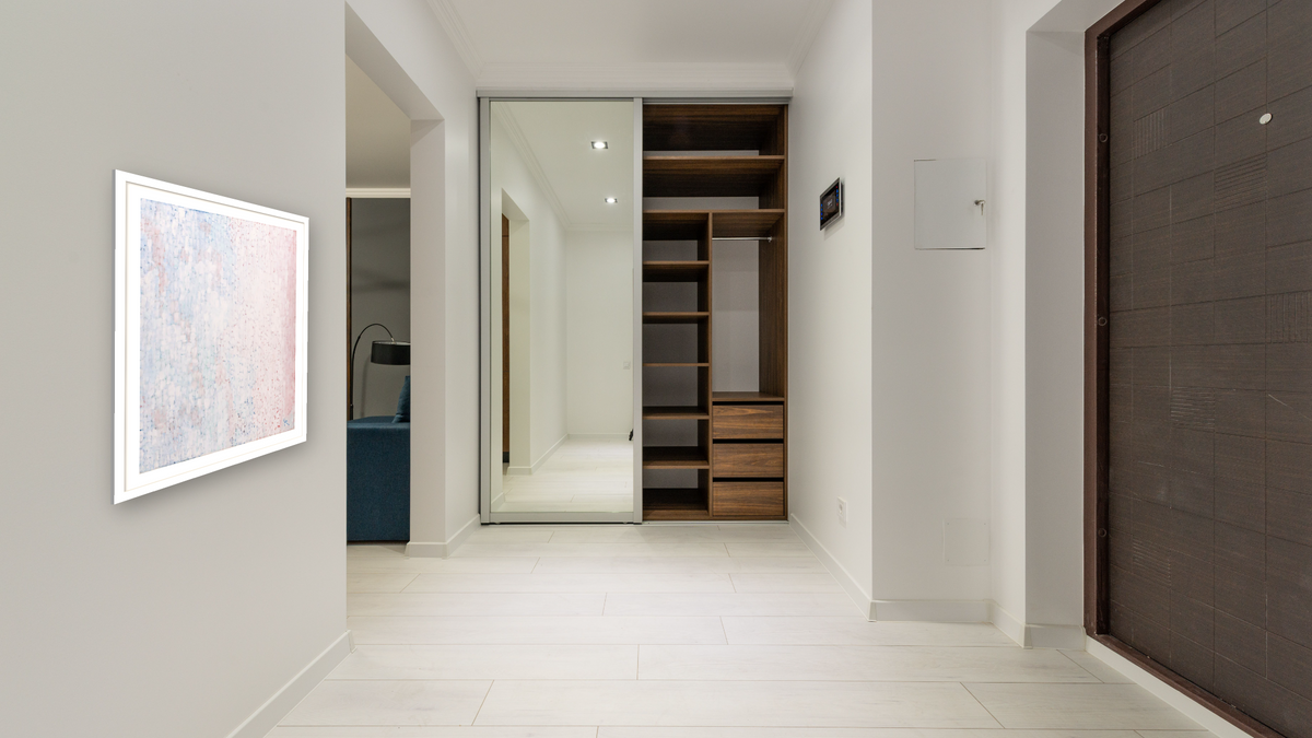 Cumulus by Alma Thomas, shown at 30 × 40 in (76.2 × 101.6 cm) in Arber Light Walnut, hallway