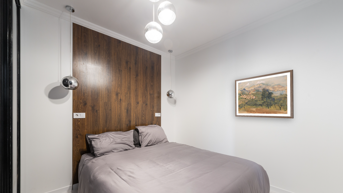 Olive Trees by Arthur Bowen Davies, shown at 28 × 42 in (71.1 × 106.7 cm) in Arber Light Walnut, bedroom