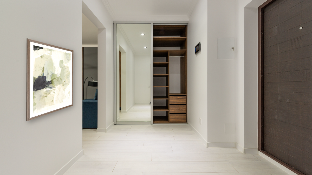 Lush 3 by Dan Hobday, shown at 30 × 42 in (76.2 × 106.7 cm) in Arber Light Walnut, hallway