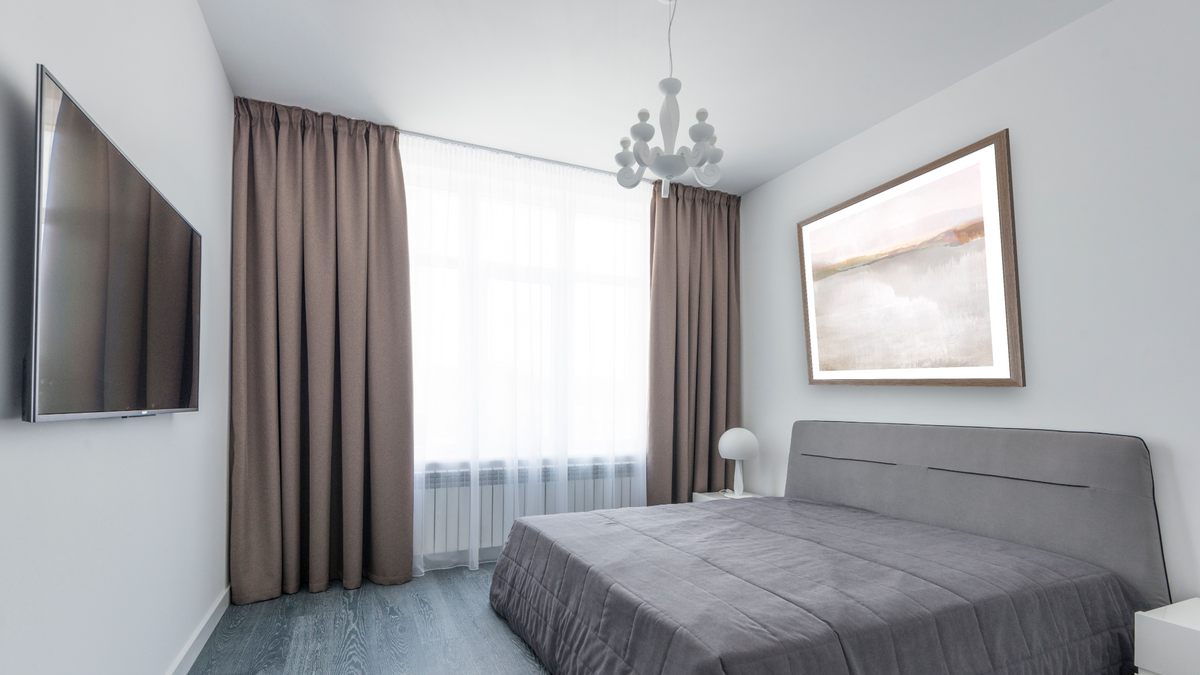 The New Day by Dan Hobday, shown at 32 × 32 in (81.3 × 81.3 cm) in Arber Light Walnut, bedroom