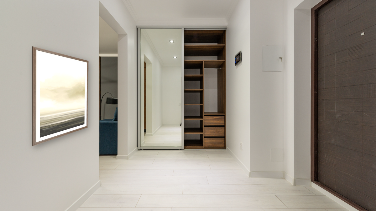 Marsh Set 2 by Dan Hobday, shown at 30 × 42 in (76.2 × 106.7 cm) in Arber Light Walnut, hallway