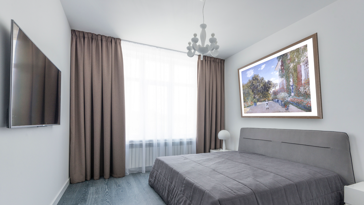 Garden of the Artist at Argenteuil by Claude Monet, shown at 33 × 40 in (83.8 × 101.6 cm) in Arber Light Walnut, bedroom