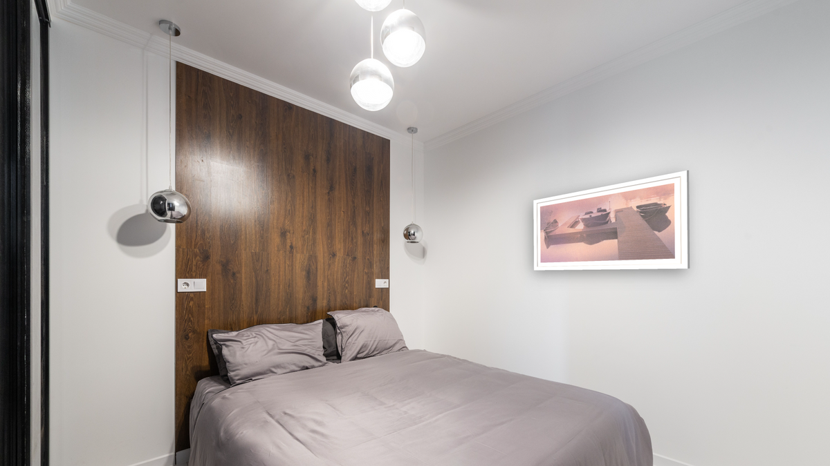 Finches Dock by Kirsten Söderlind, shown at 21 × 40 in (53.3 × 101.6 cm) in Arber Light Walnut, bedroom