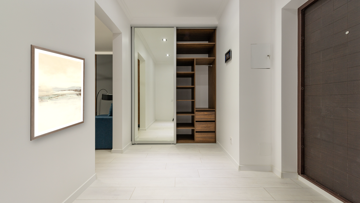 Calm Set 1 by Dan Hobday, shown at 30 × 42 in (76.2 × 106.7 cm) in Arber Light Walnut, hallway