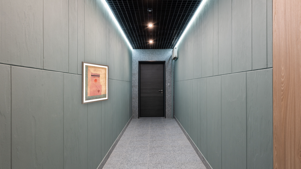 Arabian Song by Paul Klee, shown at 29 × 42 in (73.7 × 106.7 cm) in Arber Light Walnut, hallway
