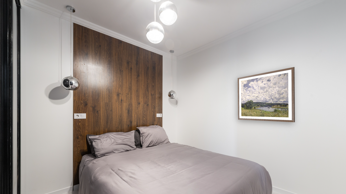 The Seine at Suresnes by Alfred Sisley, shown at 32 × 40 in (81.3 × 101.6 cm) in Arber Light Walnut, bedroom