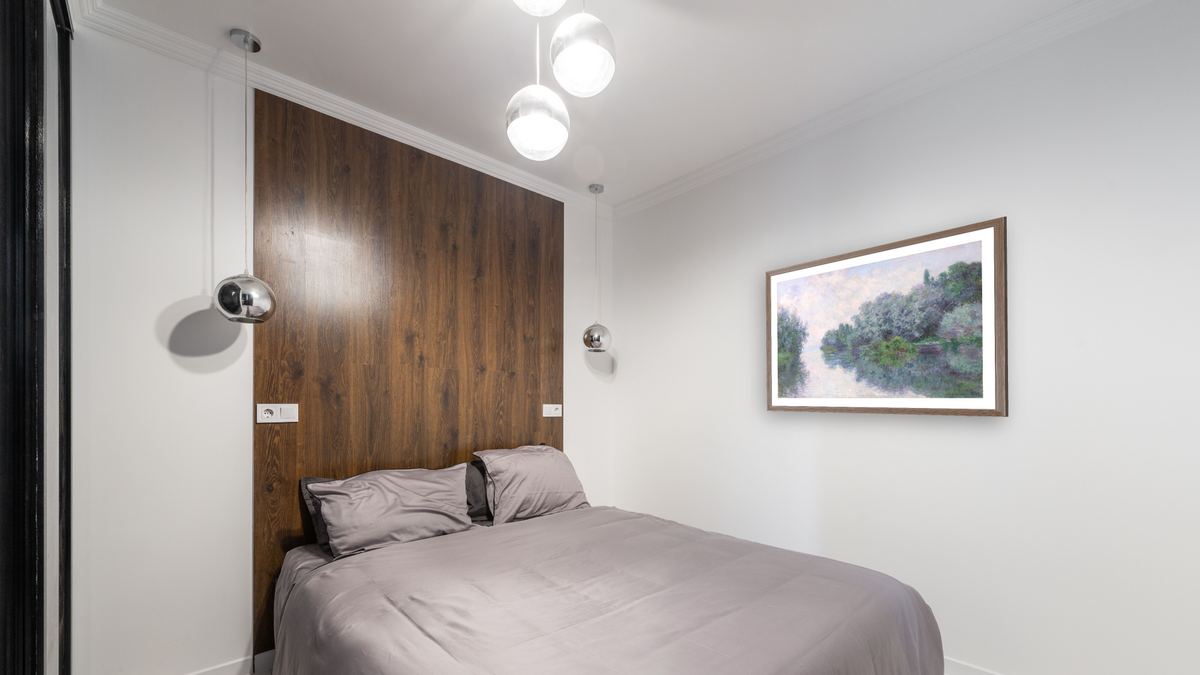 The Seine at Giverny by Claude Monet, shown at 30 × 42 in (76.2 × 106.7 cm) in Arber Light Walnut, bedroom