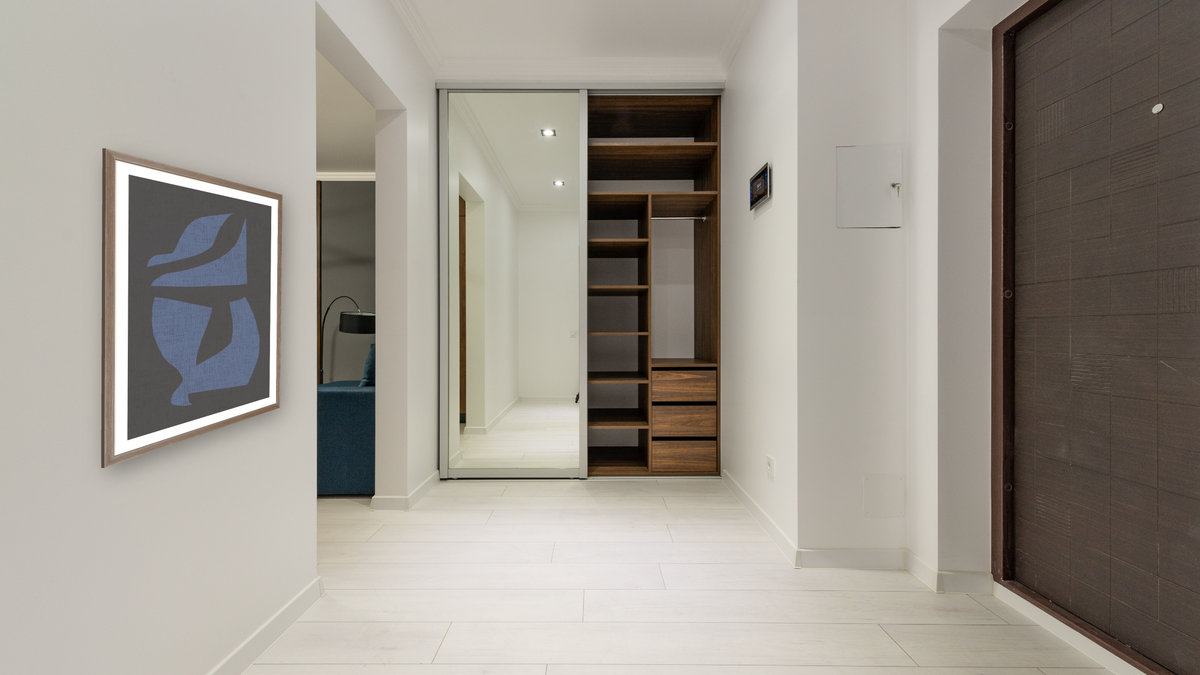 Elegance by Dan Hobday, shown at 30 × 42 in (76.2 × 106.7 cm) in Arber Light Walnut, hallway
