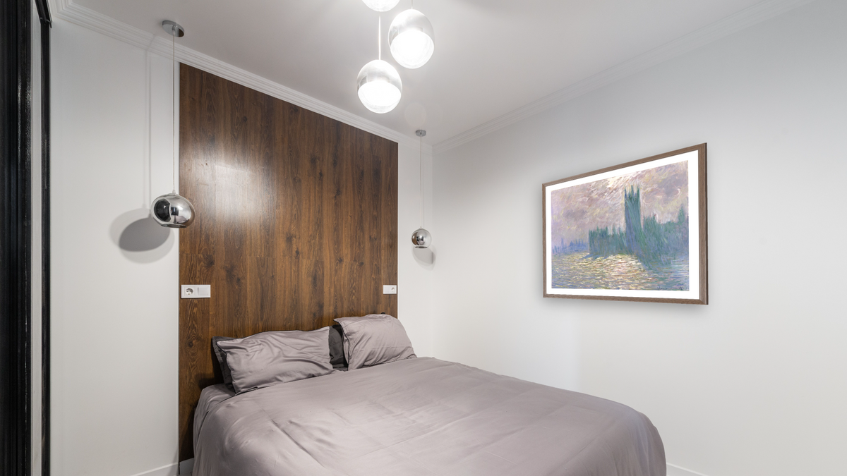 Parliament, Reflections on the Thames by Claude Monet, shown at 35 × 40 in (88.9 × 101.6 cm) in Arber Light Walnut, bedroom