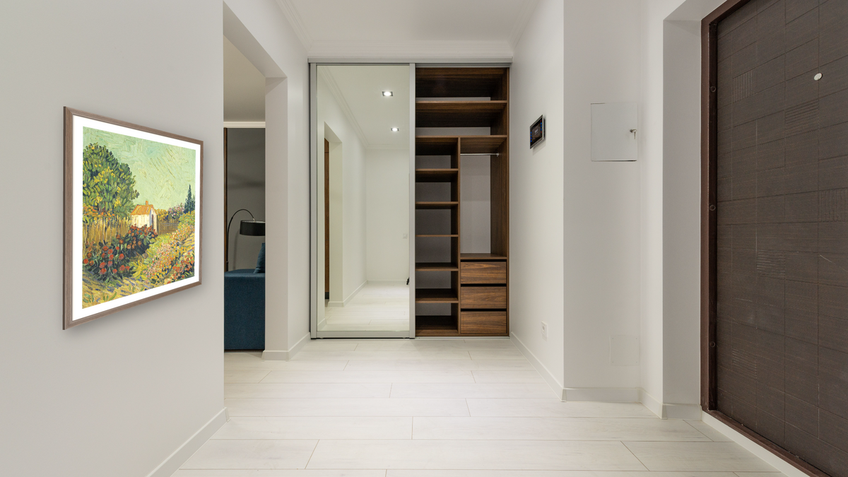 Landscape by Imitator of Vincent van Gogh, shown at 33 × 40 in (83.8 × 101.6 cm) in Arber Light Walnut, hallway