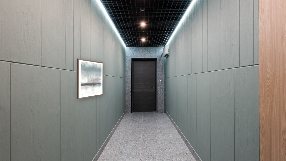 Drama 1 by Dan Hobday, shown at 30 × 42 in (76.2 × 106.7 cm) in Arber Light Walnut, hallway