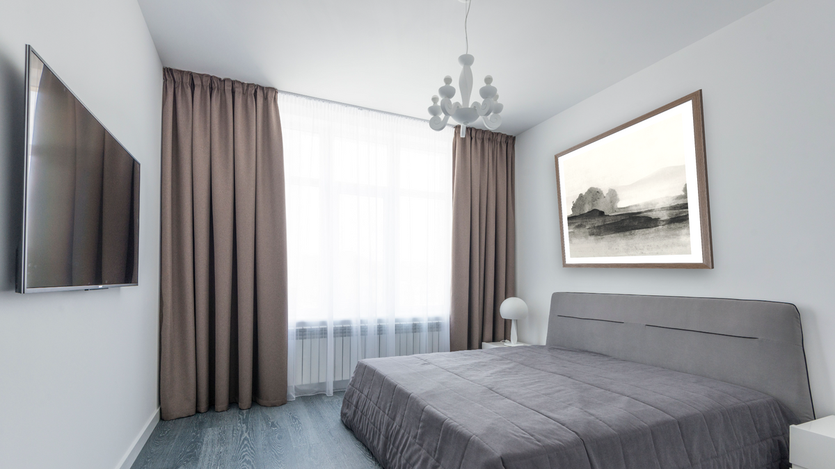 Land 1 SQ by Dan Hobday, shown at 32 × 32 in (81.3 × 81.3 cm) in Arber Light Walnut, bedroom