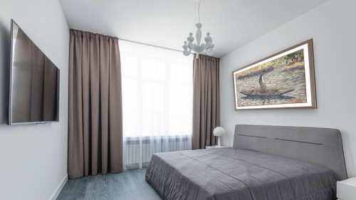 A Fisherman by Georges Seurat, shown at 27 × 42 in (68.6 × 106.7 cm) in Arber Light Walnut, bedroom [arteriel-render:v6:room_a:27x42@77,37]