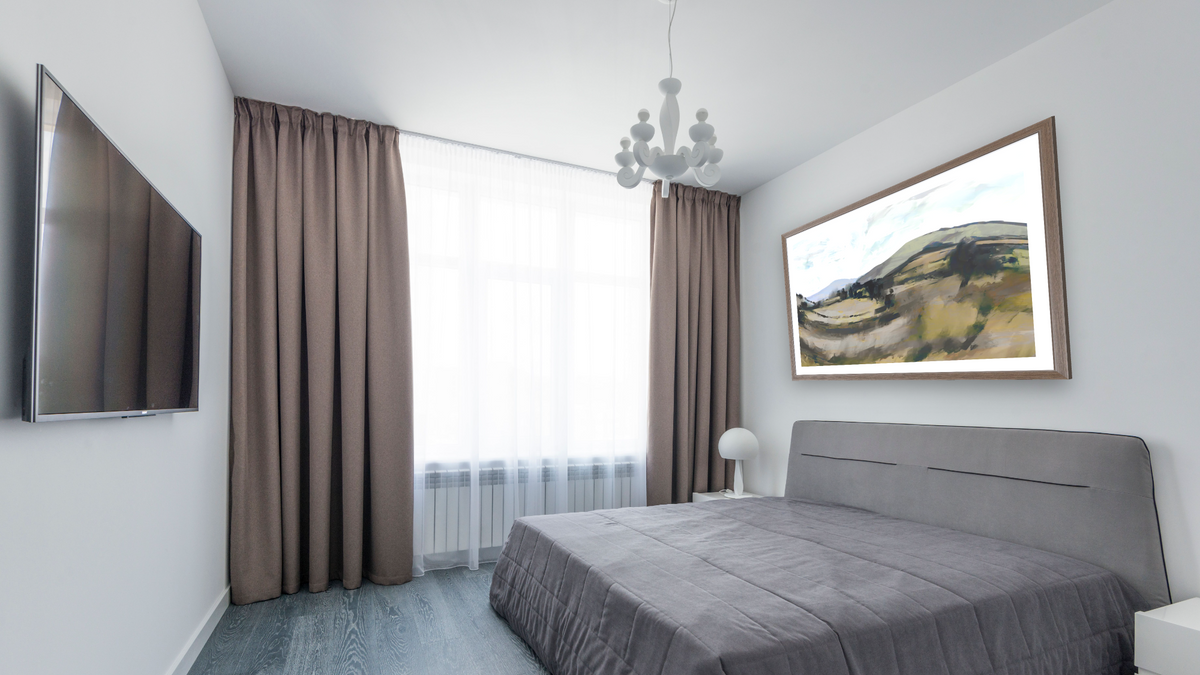 Dart by Dan Hobday, shown at 30 × 42 in (76.2 × 106.7 cm) in Arber Light Walnut, bedroom