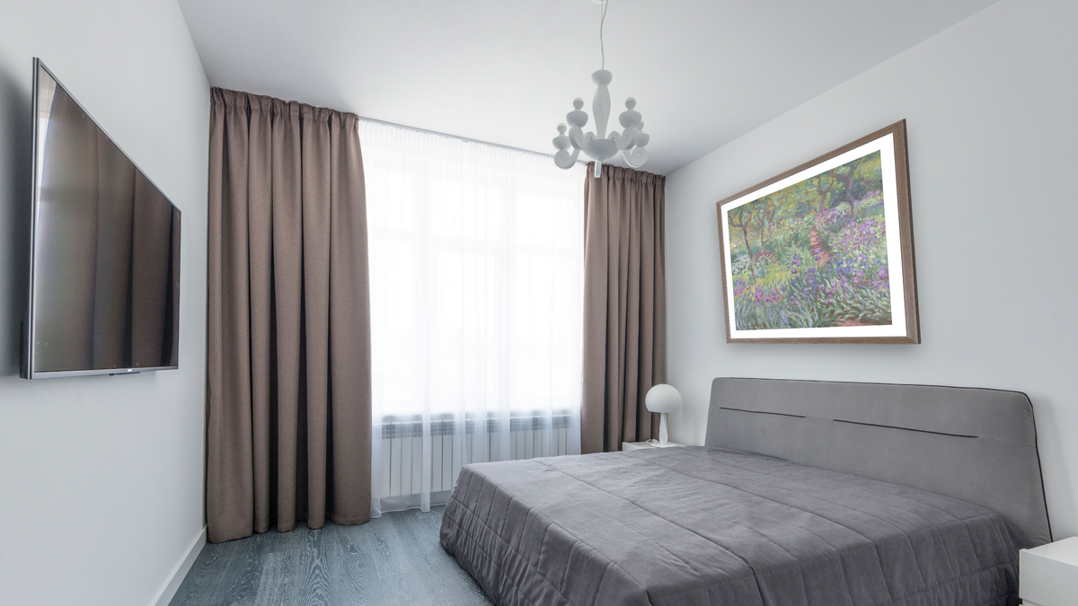 The Artist’s Garden in Giverny by Claude Monet, shown at 31 × 32 in (78.7 × 81.3 cm) in Arber Light Walnut, bedroom