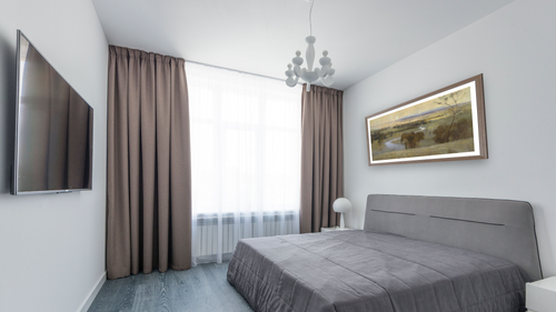 'Still glides the stream, and shall for ever glide' by Arthur Streeton, shown at 21 × 40 in (53.3 × 101.6 cm) in Arber Light Walnut, bedroom [arteriel-render:v6:room_a:21x40@77,38]