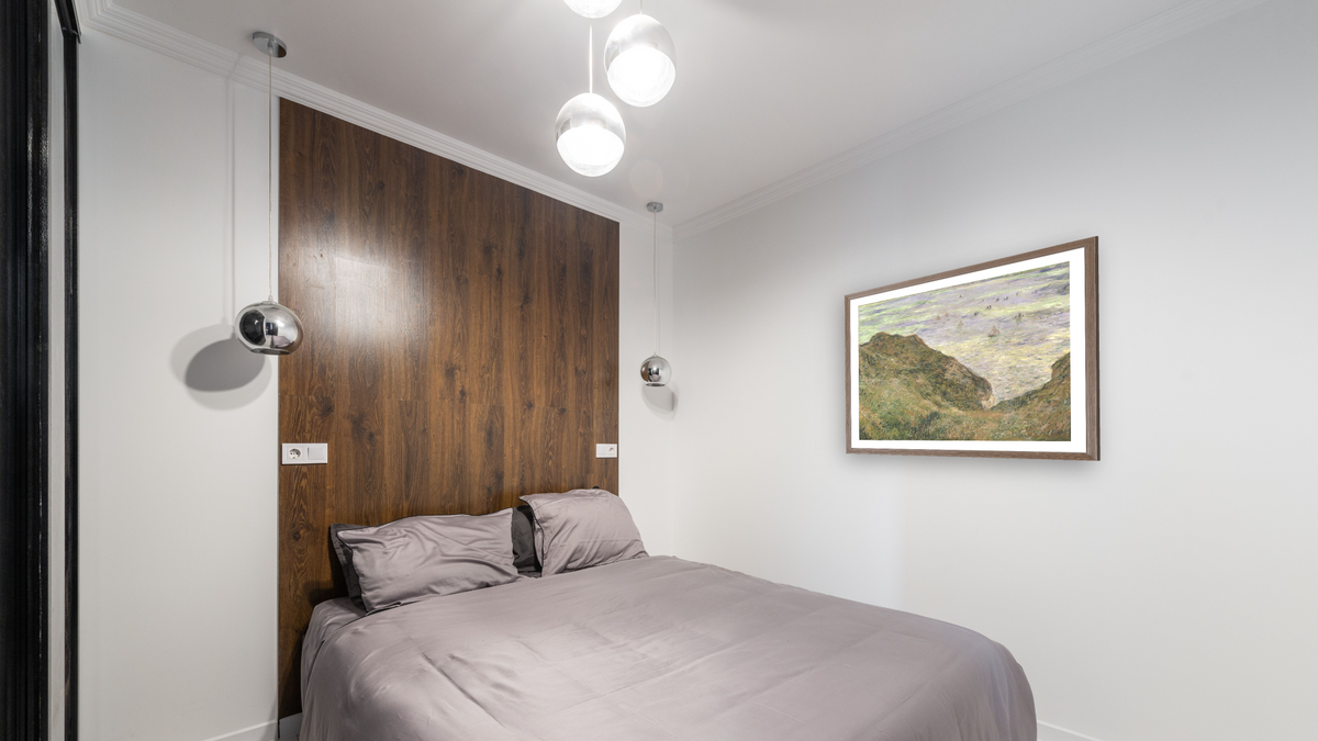 The Cliff at Pourville by Claude Monet, shown at 31 × 40 in (78.7 × 101.6 cm) in Arber Light Walnut, bedroom