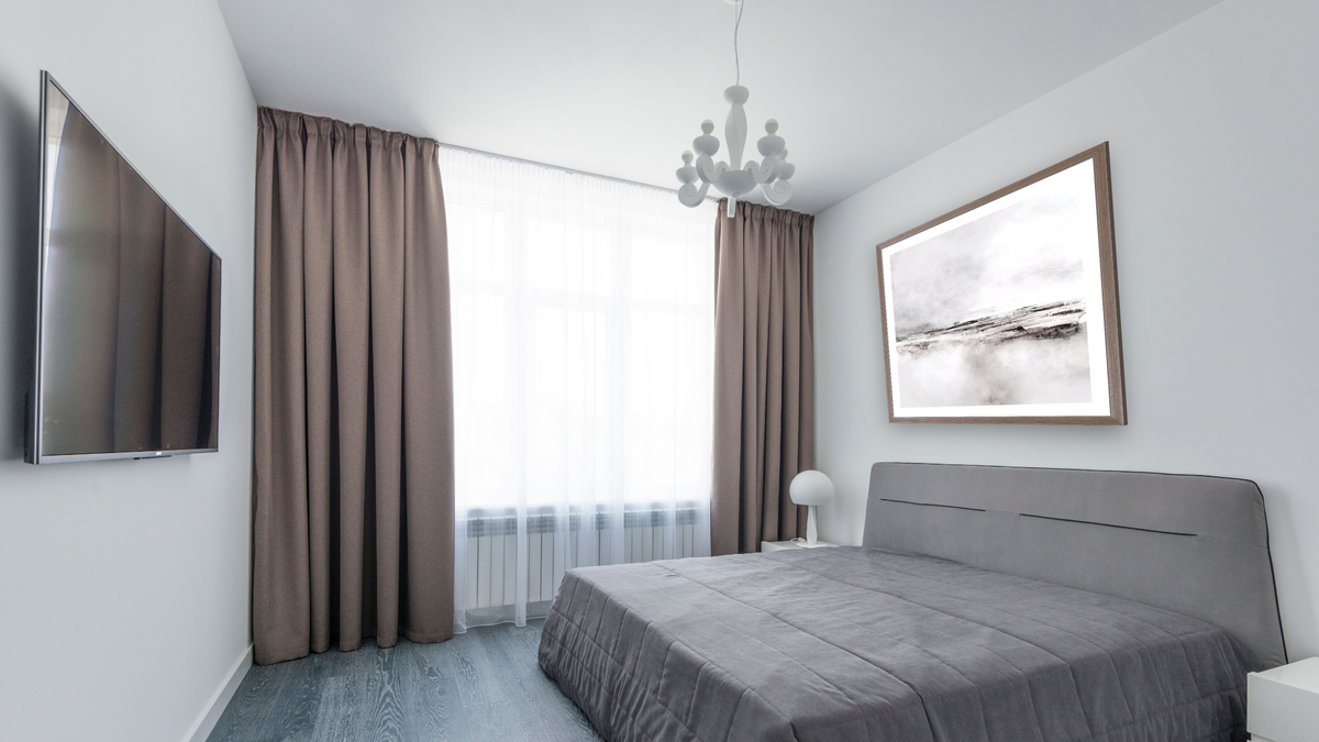 Ranch by Dan Hobday, shown at 32 × 32 in (81.3 × 81.3 cm) in Arber Light Walnut, bedroom