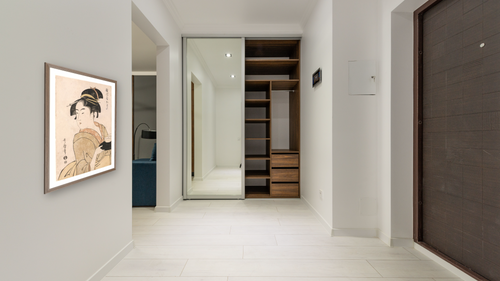 A bust portrait of the waitress Okita of the Naniwaya Teahouse by Kitagawa Utamaro, shown at 29 × 42 in (73.7 × 106.7 cm) in Arber Light Walnut, hallway [arteriel-render:v6:room_a:29x42@16,46]