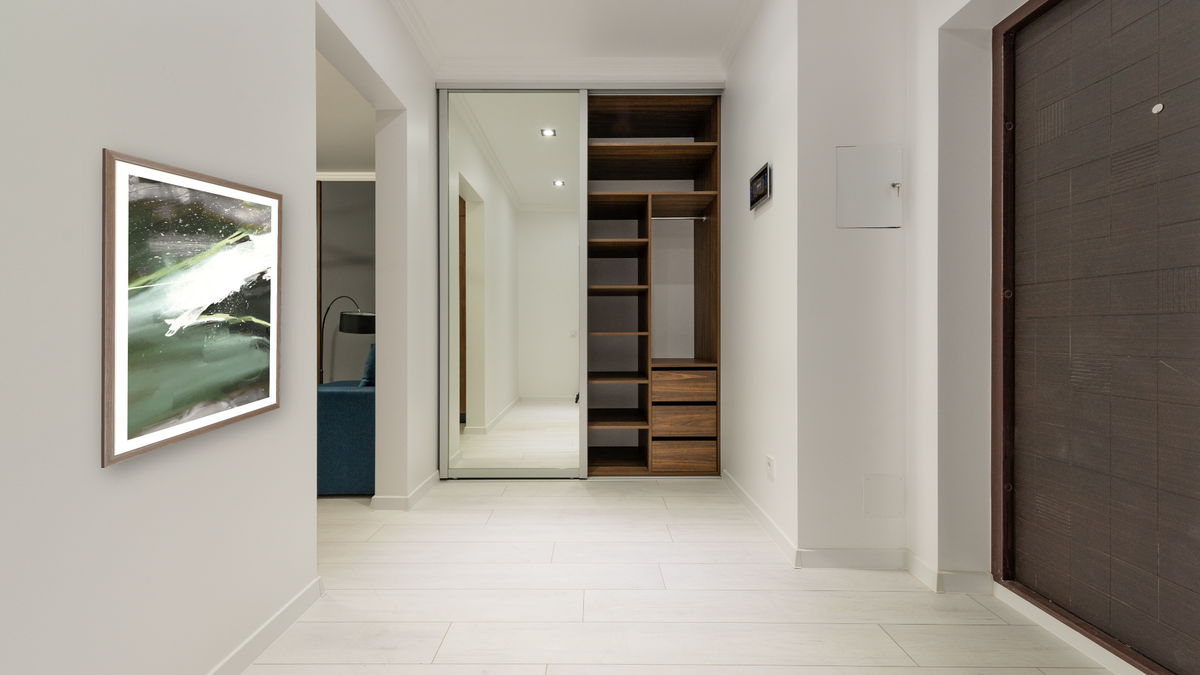 Cast 1 by Dan Hobday, shown at 30 × 42 in (76.2 × 106.7 cm) in Arber Light Walnut, hallway