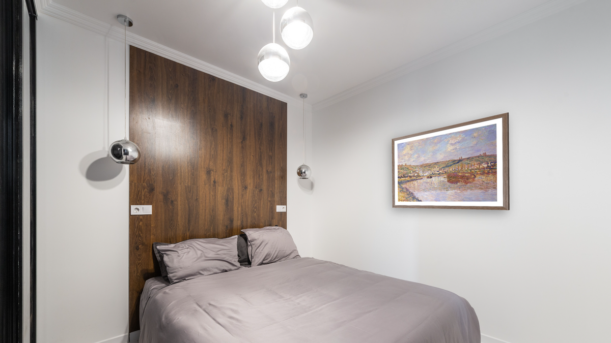 End of The Afternoon, Vetheuil by Claude Monet, shown at 29 × 40 in (73.7 × 101.6 cm) in Arber Light Walnut, bedroom