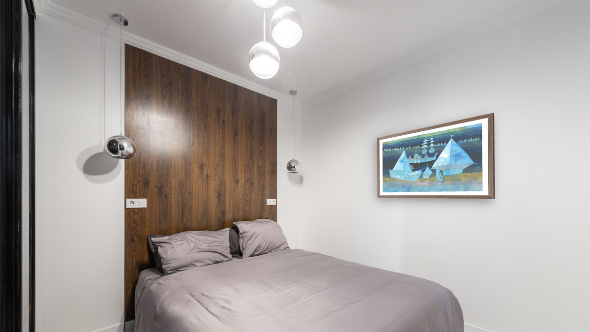 Little Regatta by Paul Klee, shown at 26 × 42 in (66 × 106.7 cm) in Arber Light Walnut, bedroom