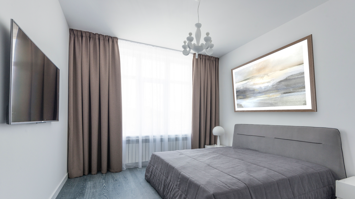 Land by Dan Hobday, shown at 30 × 42 in (76.2 × 106.7 cm) in Arber Light Walnut, bedroom