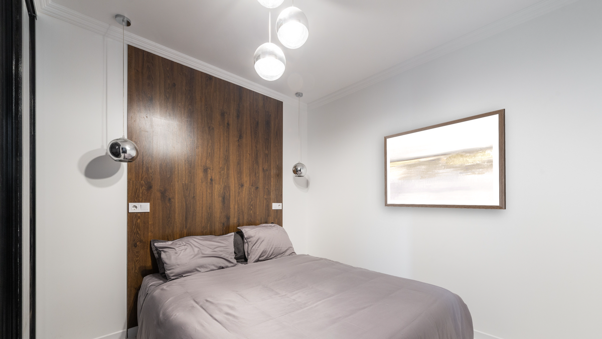 Gold Light by Dan Hobday, shown at 30 × 42 in (76.2 × 106.7 cm) in Arber Light Walnut, bedroom