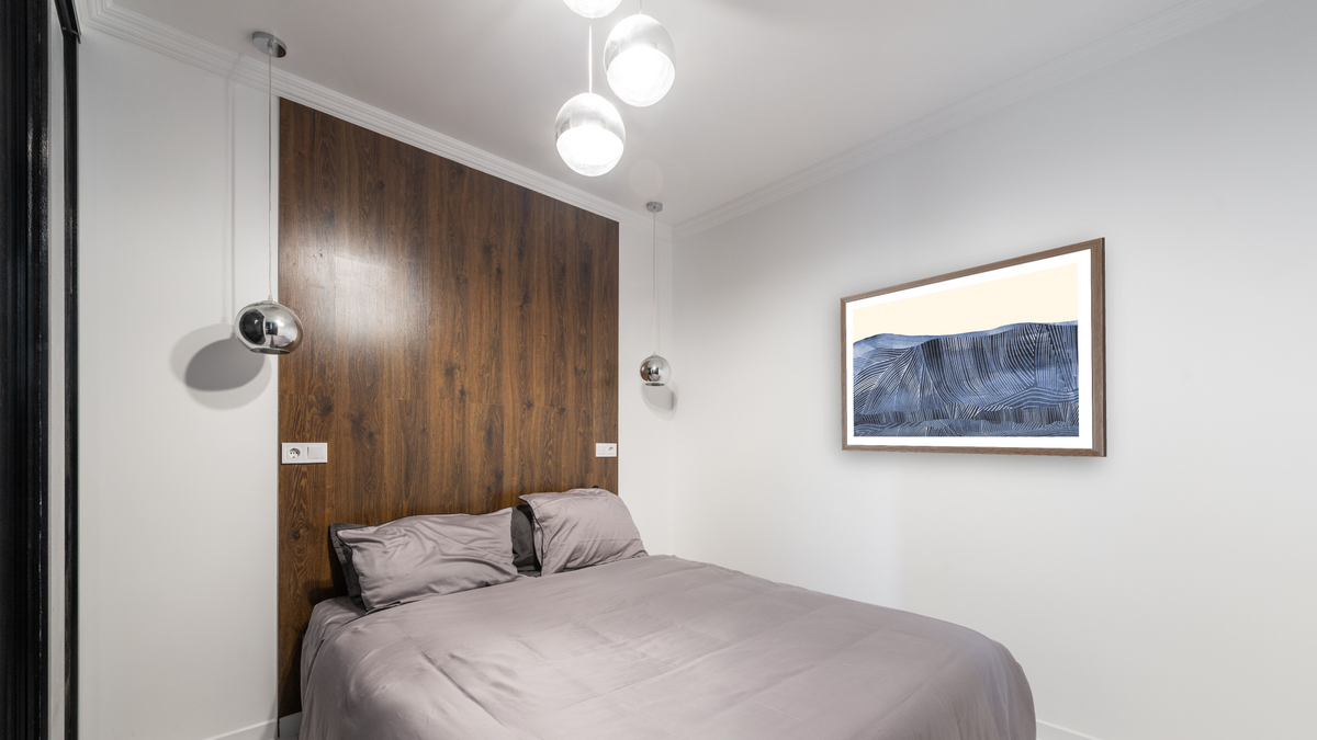 Crash by Dan Hobday, shown at 30 × 42 in (76.2 × 106.7 cm) in Arber Light Walnut, bedroom