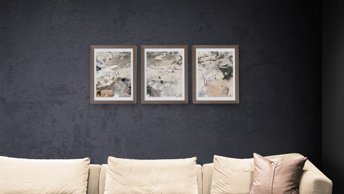 Dan Hobday's Earth triptych hanging in a furnished room
