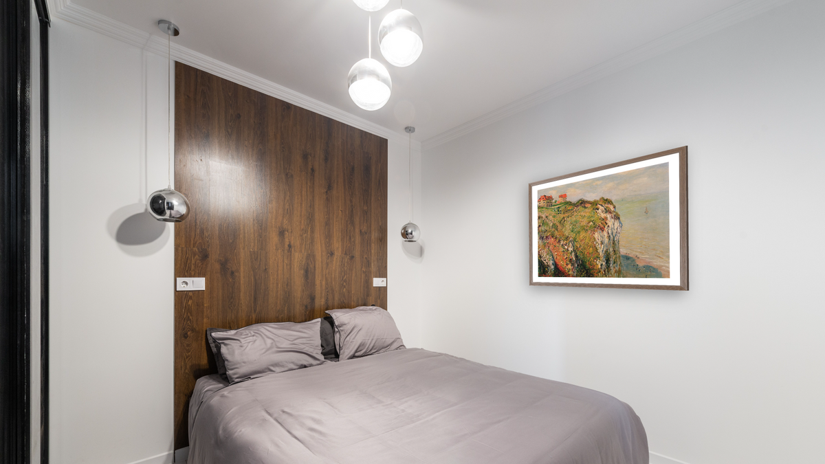 Cliff at Dieppe by Claude Monet, shown at 32 × 40 in (81.3 × 101.6 cm) in Arber Light Walnut, bedroom