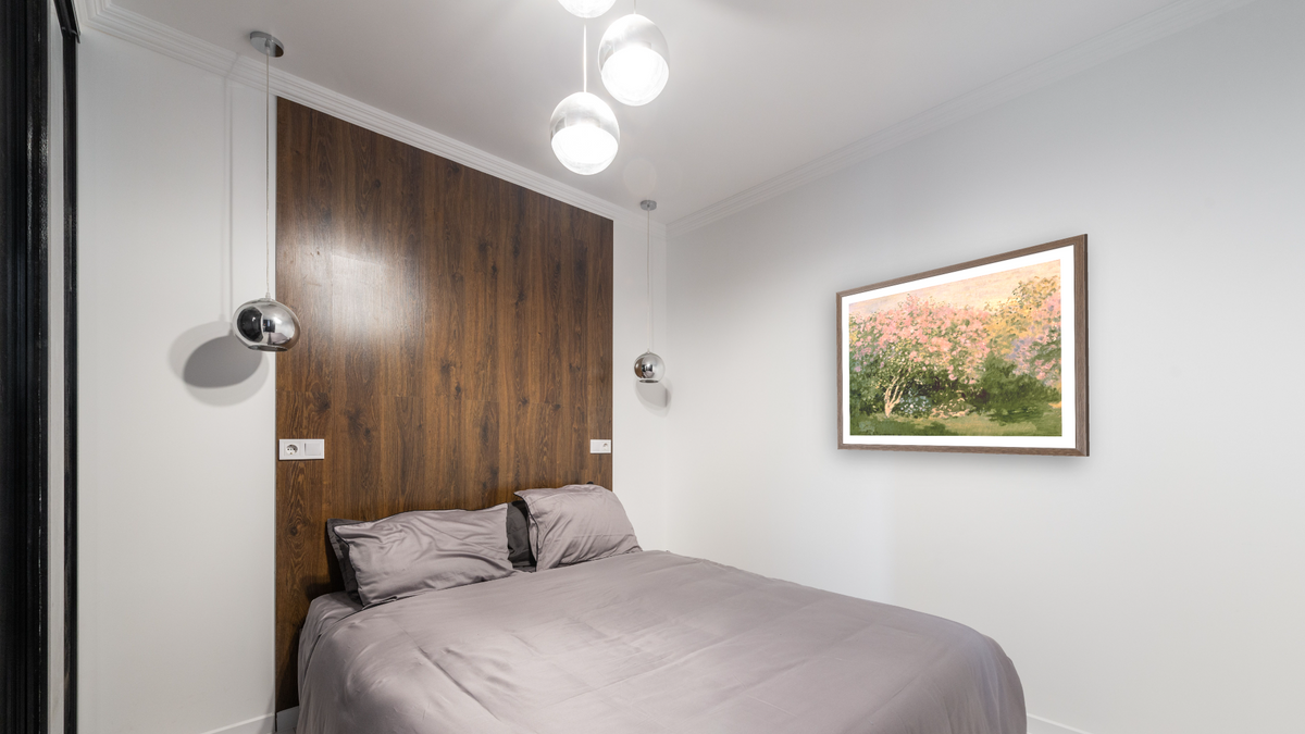 Lilac in the Sun by Claude Monet, shown at 31 × 40 in (78.7 × 101.6 cm) in Arber Light Walnut, bedroom